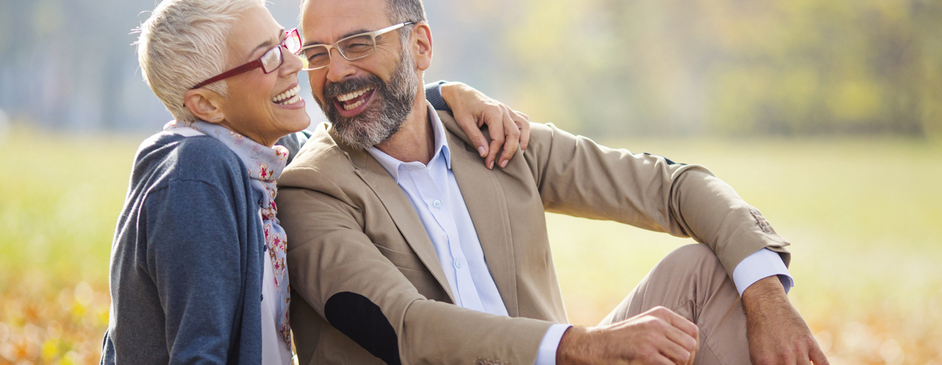 Man and woman laughing.